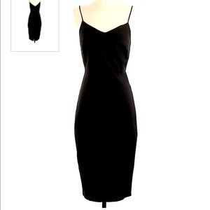 1. STATE.-woman’s black dress. Size.L